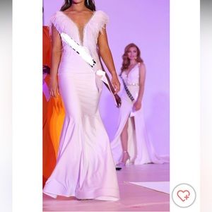 White evening gown with mermaid fit, feathers, stretchy material.Great condition